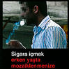 Penguenden 'sigara bırakma' çıkartmaları