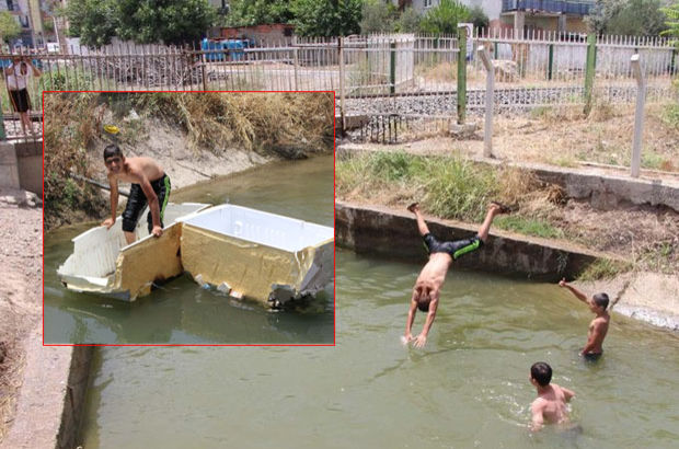 Manisa'da çocuklar DSİ sulama kanallarına akın etti