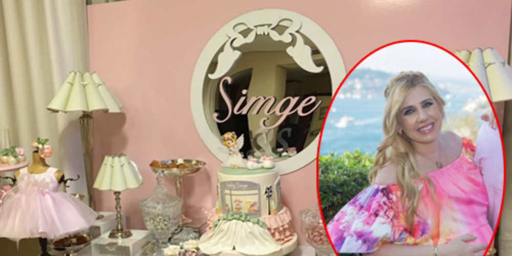 Kızı Simge'yi kucağına aldı