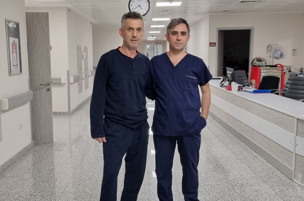 Nazmi Demir (solda) ile Doç. Dr. Murat Uğur  (sağda)