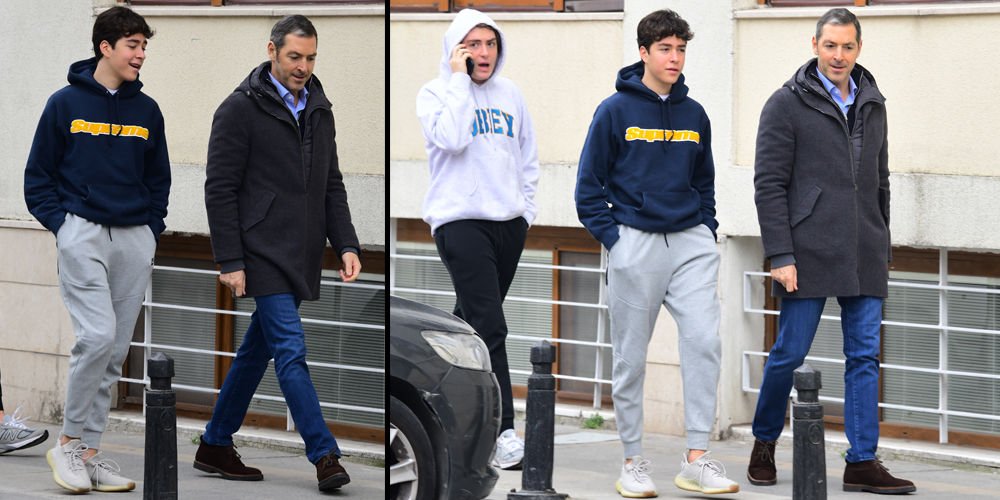 Çocuklarıyla caddelerde...