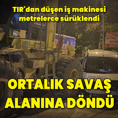 Ankara'da TIR'dan düşen iş makinesi ortalığı savaş alanına çevirdi