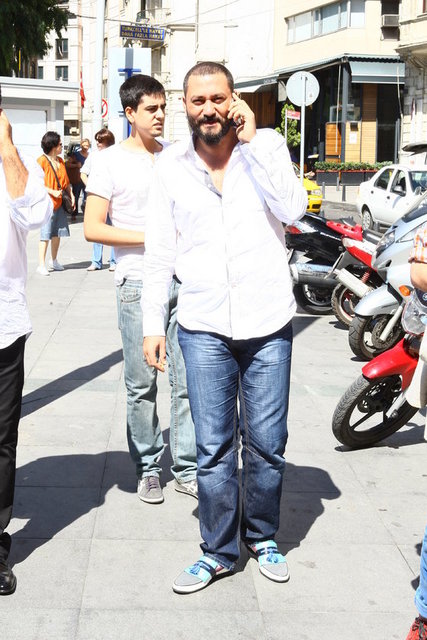 HÜSNÜ ŞENLENDİRİCİ 
