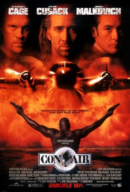 9-Con Air (1997) -  - Bir uçak hapishanesinden kaçmanın yollarını arayan 'çeşitli' mahkumların direniş hikayesi. Müzikleri, temposu ve Jerry Bruckheimer zekasıyla yürüyen, alanın içindeki 'su gibi akan' seyirliklerden biri. Aksiyon dozajıyla da her seyircinin ağzına layık.