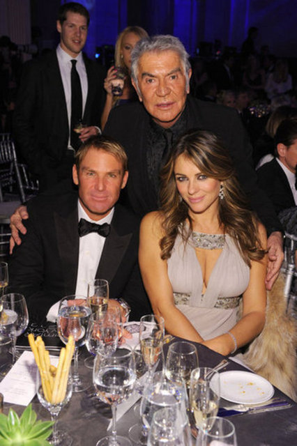 ELIZABETH HURLEY, SHANE WARNE, ROBERTO CAVALLI