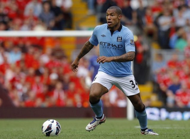İtalyan devi Milan, Manchester City'nin hırçın orta sahası, Hollandalı Nigel De Jong'u renklerine bağladı.