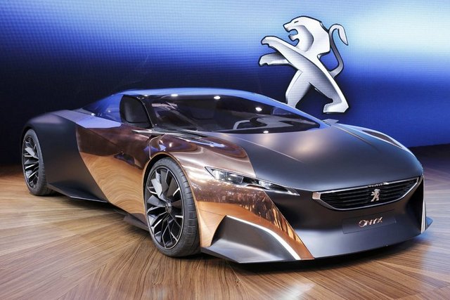 Peugeot Onyx uçuşa hazır! : -  - Fransız oto üreticisi Peugeot Onyx konsept tasarımıyla izleyicilerin karşınsa çıktı. - Bakır, karbon alaşımından oluşan dış yüzey Onyx'i otomobilden ziyade havalanmaya hazırlanan bir uzay aracına dönüştürmüş.