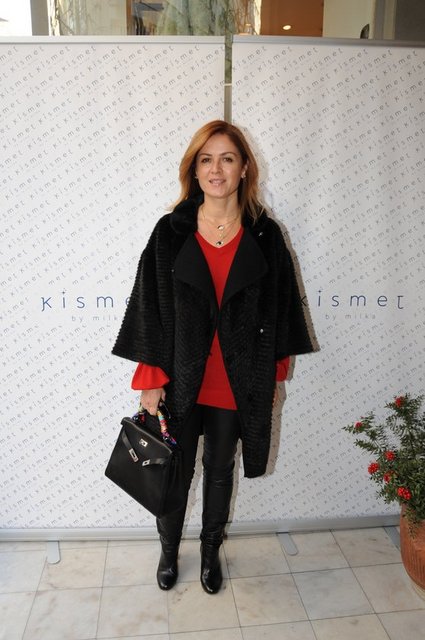 SUZAN TOPLUSOY