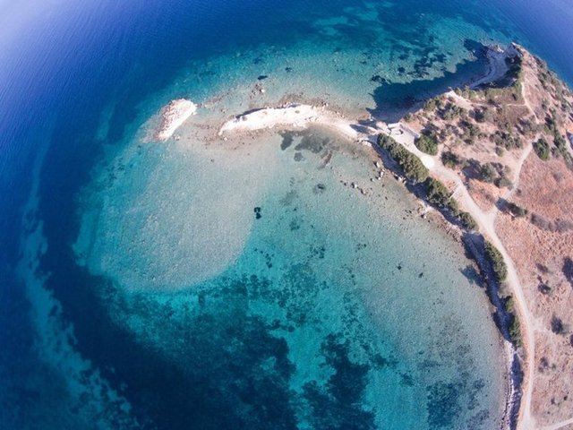 İzmir'in Dikili İlçesi'nde eski kaynaklarda bahsedilen Bademli Mahallesi'ndeki Kane antik kentininin de yer aldığı kayıp ada, jeoarkeologlar tarafından bulundu. -