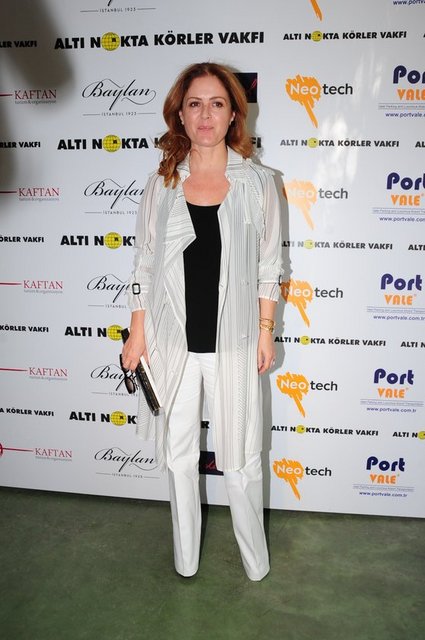 SUZAN TOPLUSOY