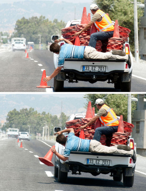 İskenderun-Arsuz karayolunda yol çizgilerini boyayan ekip, boyaların kurumasının ardından önlem olarak koydukları konileri ilginç bir yöntemle topladı