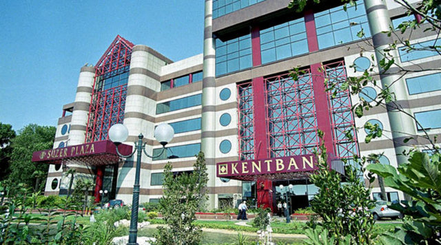 9 Temmuz 2001'de Süzer Grubu'na doğrudan kullandırılan krediler, karşılıklı krediler, Dolmabahçe Turizm'in satışı yoluyla Süzer Grubu'na kaynak aktarımı, banka kaynağının israf edilmesi gibi gerekçeler gösterilerek Kentbank'a el kondu.