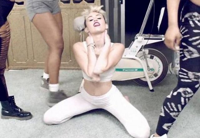 Miley naked on her knees