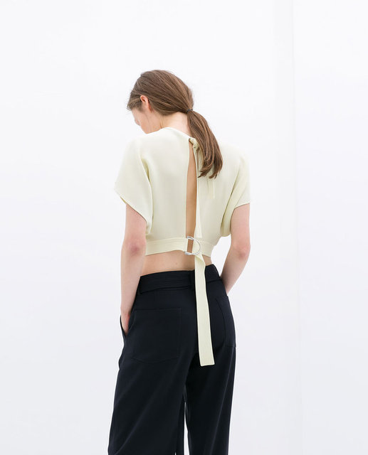 Kemer detaylı şifon sarı bluz Zara Studio 79.95 TL.