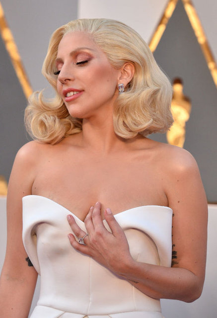 Lady Gaga, bu şarkıyı ABD'deki kampus tecavüzlerini ele alan 2015 yapımı 'The Hunting Ground' belgeseli için seslendirmiş, Oscar ödüllerinde de En iyi Özgün Şarkı kategorisinde aday olmuştu.