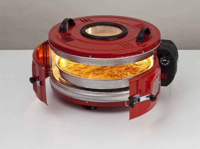 Genelde buzdolabının üzerinde bulunan davul fırın.