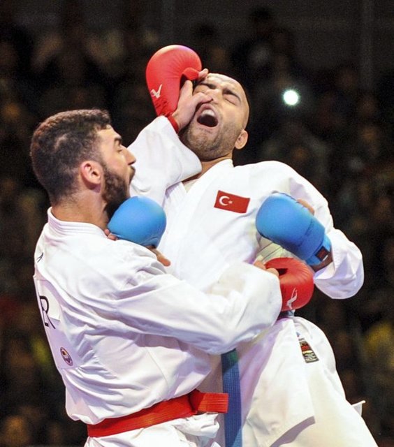 Karate Milli Takımı'nda 84 kiloda mücadele eden Gökhan Gündüz (sağda), Almanya'yı temsil eden Mehmet Bolat'ı (solda) yenerek bronz madalya kazandı. -  - 8.11.2014