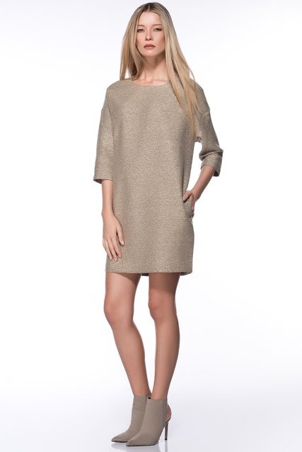 Dore, 2015 kış modasının en ön plana çıkan tonlarından biri olacak. Doreyi, gece kullanma kaidesine takılmadan, günlük hayatınızda da rahatlıkla kullanabilirsiniz. Elbise Milla by Trendyol 89.99 TL.