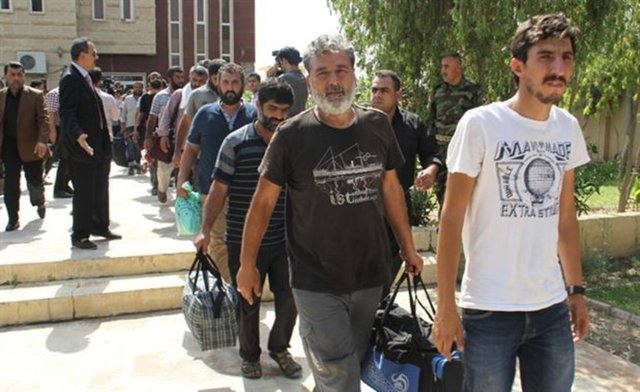 Irak'ın Musul kentinde IŞİD militanlarınca alıkonulan 32 Türk tır şoförü, 23 gün sonra serbest bırakıldı -