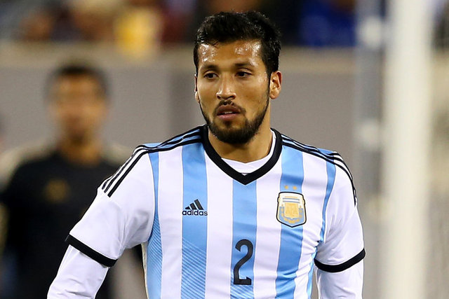 77 Ezequiel Garay