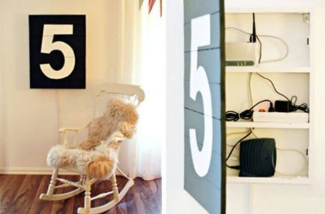 Salon duvarında bir fotoğrafın arkasına gizli bölme yapabilirsiniz.