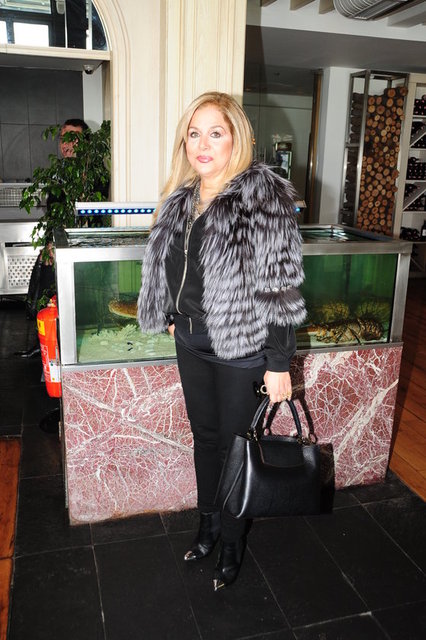 TÜLAY ÖZMEN 