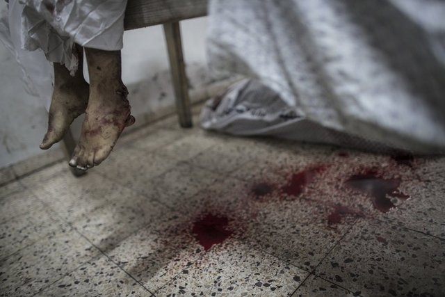 EPA foto muhabiri Oliver Weiken ''2014 Gazze Savaşı'' başlıklı fotoğraflarıyla ''seri haber" kategorisinde birincilik ödülüne layık görüldü.