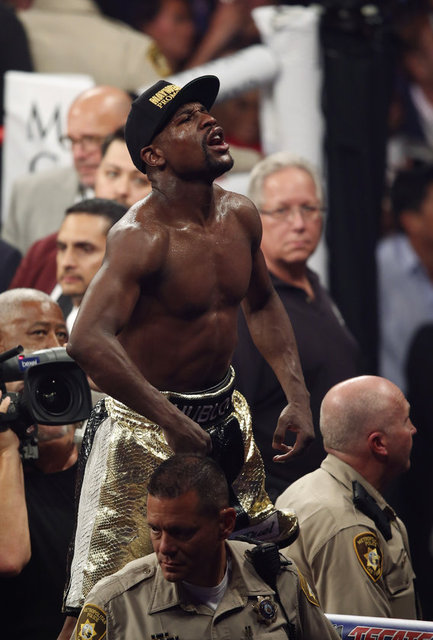 ABD'de yapılan profesyonel boks dünyasının "asrın müsabakası" olarak ilan ettiği Floyd Mayweather ile Manny Pacquiao arasındaki yarı orta sıklet unvan maçını, 12. rauntta puanla ABD'li Mayweather kazandı.