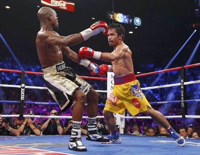 Kariyerindeki 47 karşılaşmayı da kazanan 38 yaşındaki Mayweather ile "8 farklı sıklette dünya şampiyonu olan tek boksör" 36 yaşındaki Filipinli Pacquiao karşılaştı.