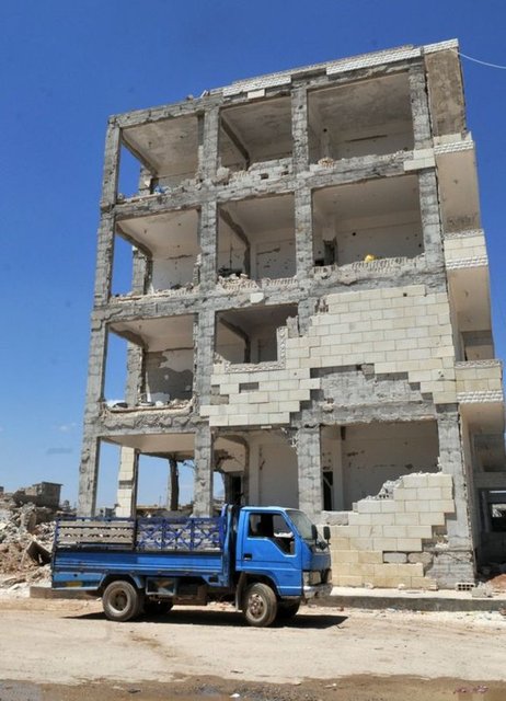 ÖZGÜRLÜK MEYDANI MÜZE OLACAK IŞİD ile YPG arasında 5 ay süren savaşın ardından Kobani'deyse neredeyse sağlam bir bina kalmamış durumda.