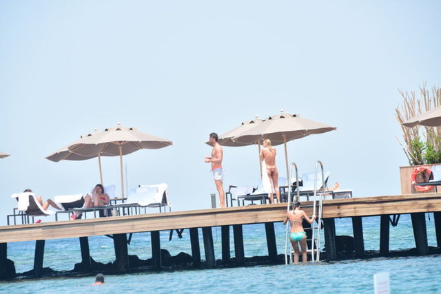 Nuri ALTUNTAŞ / HT MAGAZİN - Yeni filmi 'Ali Baba ve 7 Cüceler'in çekimlerini tamamlayınca soluğu Bodrum'da alan Cem Yılmaz, İstanbul'a döndü.