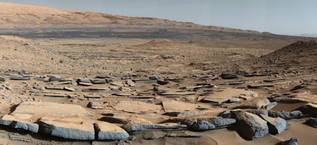 Mars'ın yüzeyini detaylı şekilde gösteren büyüleyici bir fotoğraf.