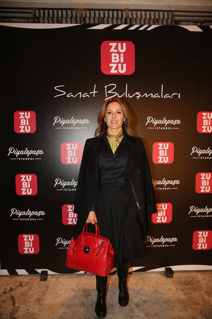 SUZAN TOPLUSOY