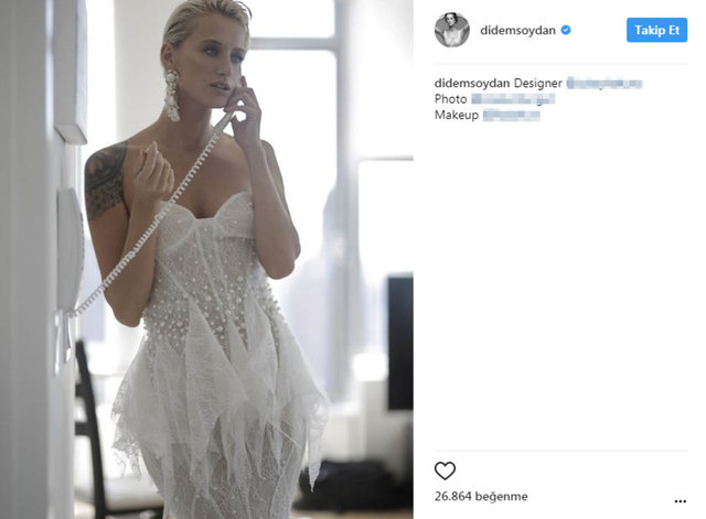 Üzerinde gelinlik, telefonla konuşurken çekilmiş karesini Instagram'da paylaşan Didem Soydan, kısa sürede çok sayıda beğeni aldı. -  