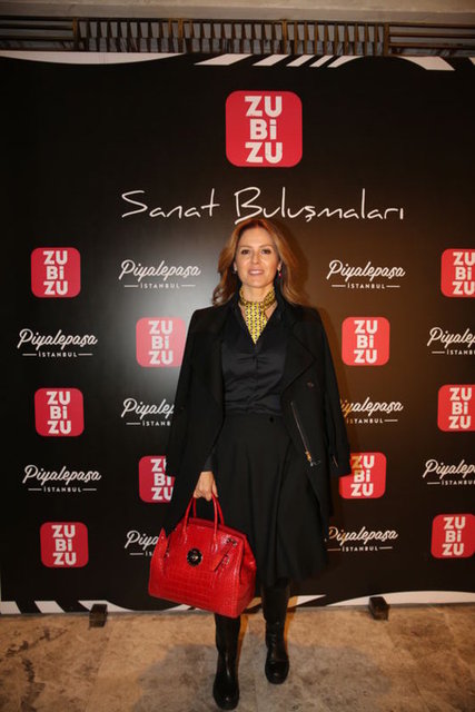 SUZAN TOPLUSOY