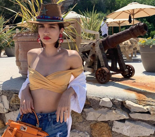 MELİSA TAPAN