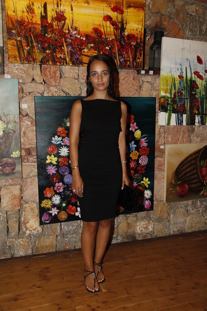 MELİSA TAPAN