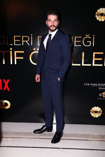AKIN AKINÖZÜ