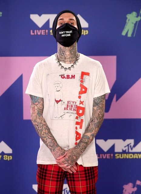 TRAVIS BARKER