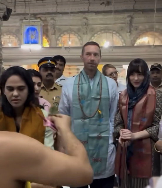 DAKOTA JOHNSON, CHRIS MARTIN