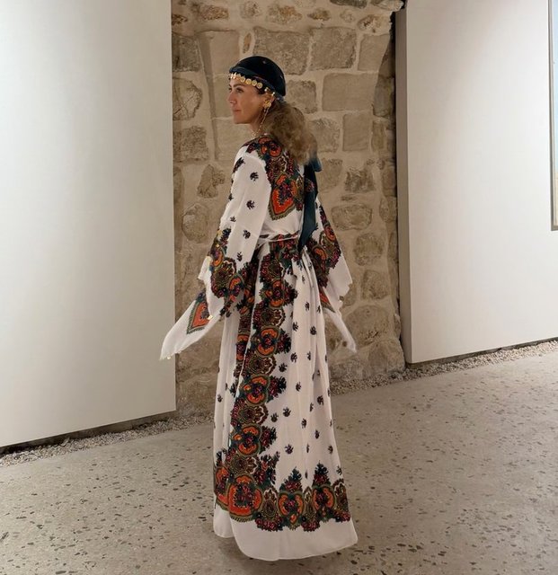 SUZAN TOPLUSOY