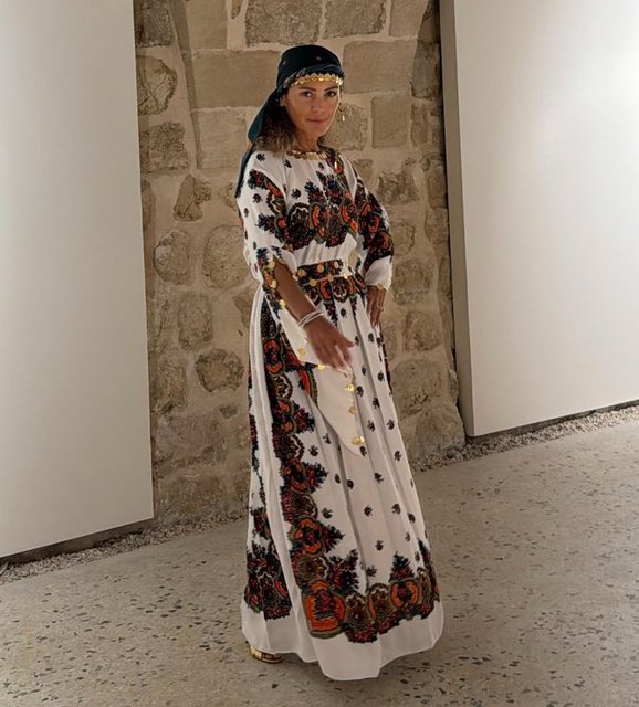 SUZAN TOPLUSOY