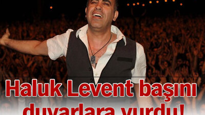 Haluk Levent başını duvarlara vurdu