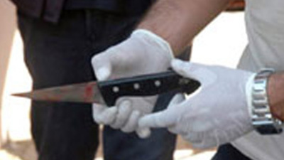 Travestinin boğazını kestiler!