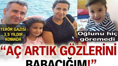 'Aç artık gözlerini babacığım!"