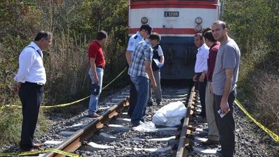 Karısını öldürüp tren rayına attı!