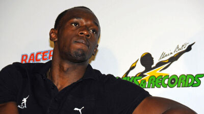 Bolt gazetecilerle yarıştı!