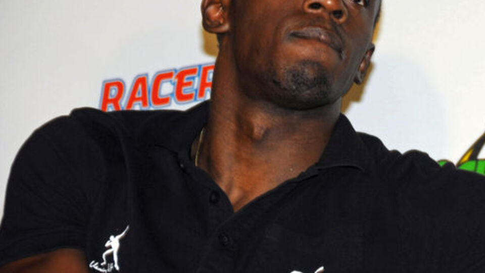 Bolt gazetecilerle yarıştı!