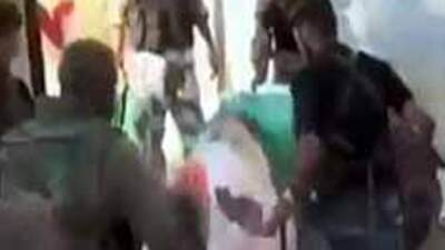 'Öcalan' posterini çiğnediler