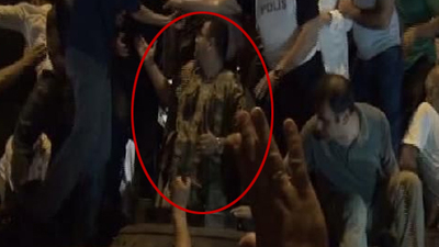 Eski emniyet müdürü askeri kamuflajla tank içinden çıktı!